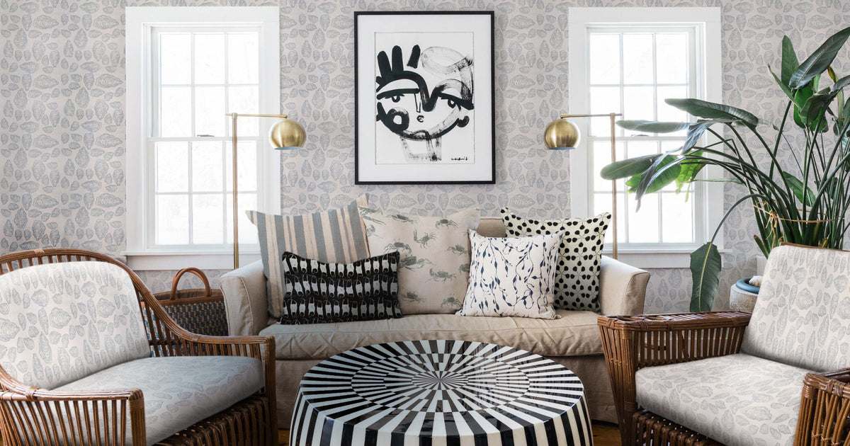 Seaside living room featuring our oyster shell wallpaper—a coastal classic that brings the allure and texture of the shore indoors with effortless style.